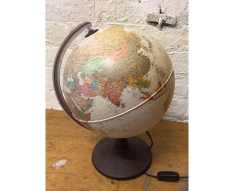 A c2010 terrestrial globe table lamp, stamped Nova Rico to base, measures 45cm high