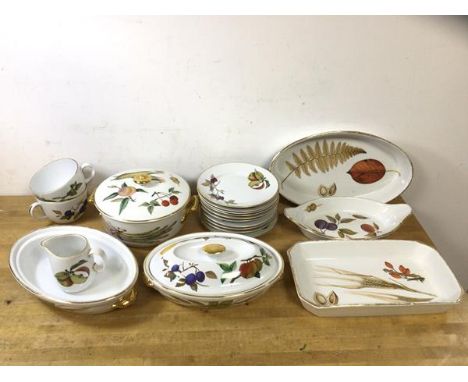 A Royal Worcester Evesham part set of china including tureen measuring 13cm high, serving plates, two cups, ten bread plates,