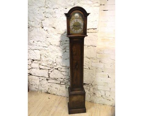 A Waring and Gellow limited 1920's/30's oak grandmother clock of architectural form, measures 170cm x 30cm x 22cm