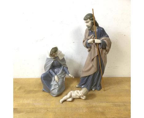 A Holy Family group of Nao figures including Mary, Joseph and baby Jesus,  measures 28cm high