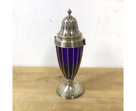 A 1903 Birmingham silver sugar caster, the perforated top with caged body holding a blue glass bowl to interior, on circular 