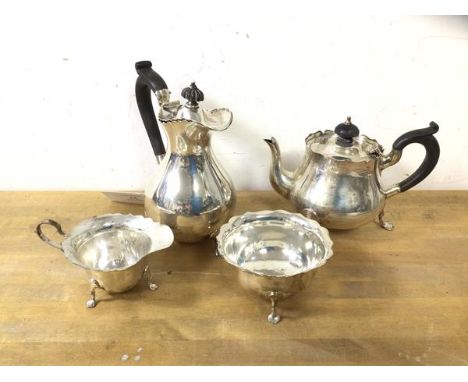 An Edwardian 4-piece, London silver, Batchelor tea service including coffee pot which measures 17cm high, also a teapot, suga