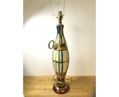 An Italian ceramic table lamp in the form of an elongated bottle with polychrome decoration, measures 58cm to top of lamp hol