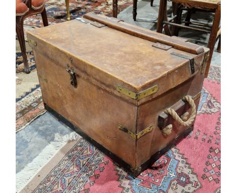 Early 20th century Tan leather and iron bound military issue travelling trunk, of rectangular form, stamped with broad arrow 