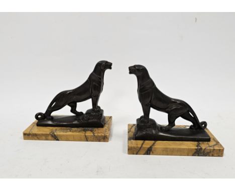 Pair of French Art Deco patinated bronzed spelter models of panthers on marble bases, each signed Frecourt, GR France, on och