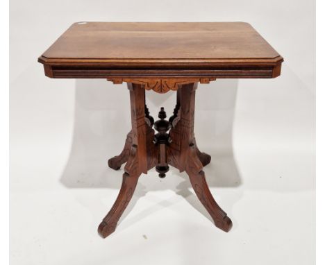 Late Victorian mahogany occasional table, the rectangular top with chamfered corners, on four carved supports, 69cm high x 76