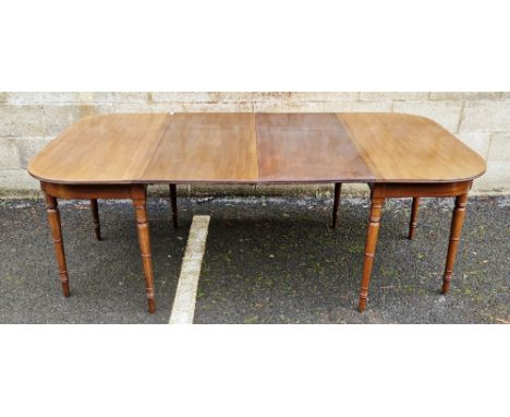 19th century mahogany extending D-end dining table&nbsp;with two additional leaves, raised on turned legs, 71cm high x 103cm 