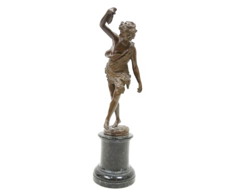 After Max Lindenberg (1873-1910) bronze figure of a dancing Bacchic youth, holding a tambourine and wearing a pelt, on a mott