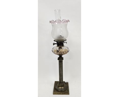 Edwardian brass-mounted oil lamp, with amethyst acid etched baluster frilled shade above a Youngs Duplex burner and compresse