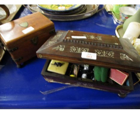 ROSEWOOD AND MOTHER OF PEARL INLAID SEWING BOX AND CONTENTS TOGETHER WITH AN OAK FRAMED METAL MOUNTED TWO SECTIONAL TEA CADDY