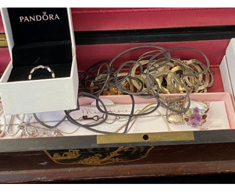 Silver costume jewellery in a vintage jewellery box 