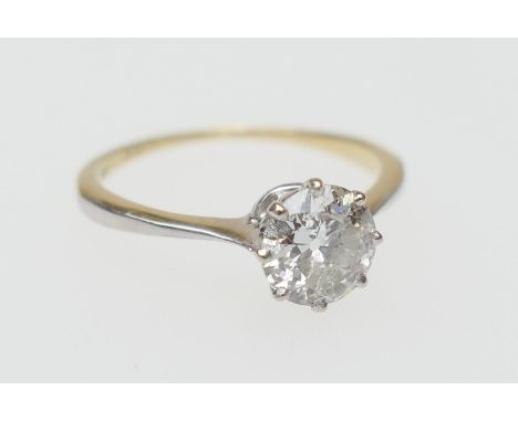 Diamond solitaire ring, old round cut stone of approx. 0.75ct, colour estimated as M/N, and clarity as I2, set in white metal