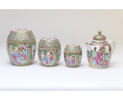 Set of three Cantonese famille rose barrel shaped covered jars, late 19th Century, the largest 12.5cm, the smallest 8cm; also
