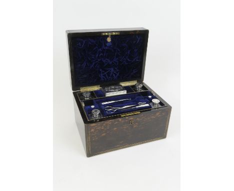 Victorian coromandel vanity box, by Lund, Fleet Street, London, having a fitted interior with four silver mounted bottles and