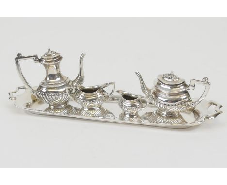 Miniature silver tea/coffee service, Birmingham 1970, comprising coffee pot, 4cm, teapot, sucrier and milk jug, presented on 