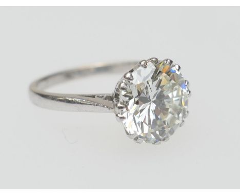 Diamond solitaire ring, the round brilliant cut diamond certificated as being approx. 3.29cts, K/L in colour and VVS clarity,