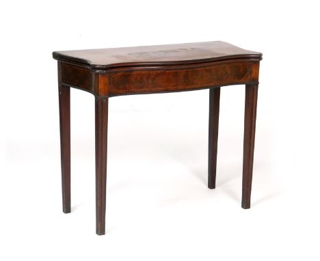 Late George III mahogany card table, circa 1800, the serpentine folding top crossbanded with walnut and with boxwood and ebon