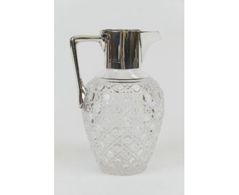 Late Victorian silver mounted cut glass claret jug, silver mounts by William Gibson and John Langman, London 1898, with crest