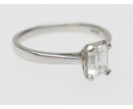 Diamond solitaire ring, the certificated emerald cut diamond being 1.03ct, I in colour and VS2 clarity, IGI report no. F6C628