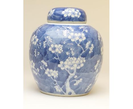 Chinese blue and white prunus pattern ginger jar and cover, 19th Century, painted Kangxi four character mark, height 21cm (Pl