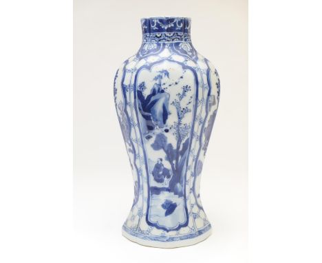 Chinese blue and white bottle vase, Kangxi (1662-1722), of lobed inverted baluster form decorated with vertilinear panels of 
