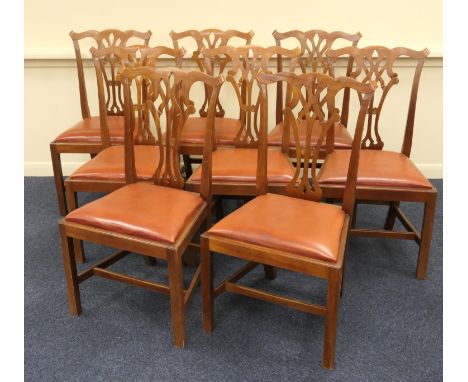 Set of eight mahogany dining chairs in the Chippendale style, 20th Century, with red leatherette squab seats (matching lot 57
