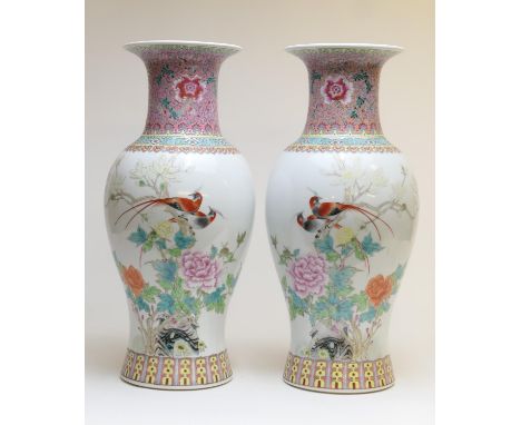 Pair of Chinese Republic porcelain vases, decorated with birds amidst magnolia and peony in famille rose palette, Jingdezhen 