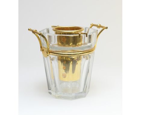 Baccarat studio crystal ice pail, of heavy tapered octagonal form with gilt metal carrying handles and bottle liner, height 2