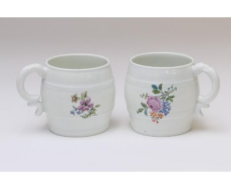 Pair of Chantilly porcelain barrel form cups, circa 1740-60, decorated with polychrome floral sprays, iron red mark, height 7