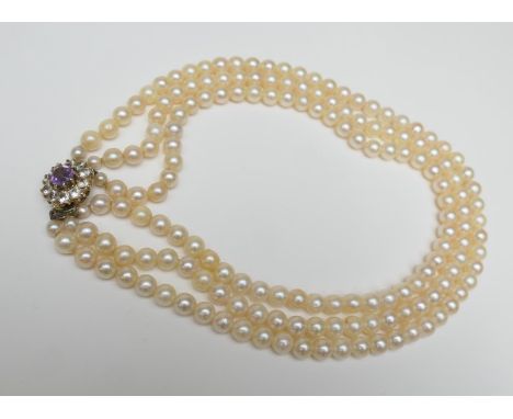 Cultured pearl three strand choker necklace, the pearls well matched and relatively uniform in size, being of approx. 6mm dia