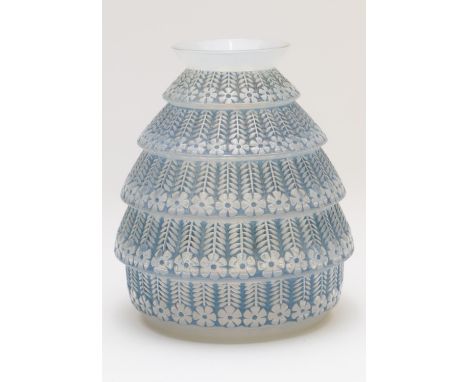 Lalique Ferrieres vase, moulded with stylised flowers, tinted blue, engraved mark 'R Lalique, France' and numbered '1019', he