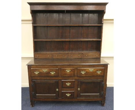 North Wales oak dresser with boarded plate rack and spice drawers, 19th Century and later, width 142cm, height 188cm, depth 5