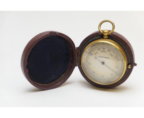 Compensated pocket barometer, in a gilt brass case, 46mm diameter, original leather outer case (Please note condition does no