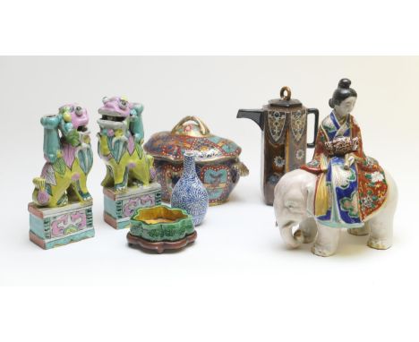 Japanese and other porcelains comprising an Arita porcelain model of a Bijin riding on an elephant, decorated in colours, lat
