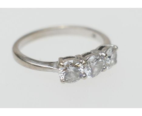 Diamond three stone ring, by Mappin &amp; Webb, the round brilliant cut stones well matched in colour and clarity, being appr