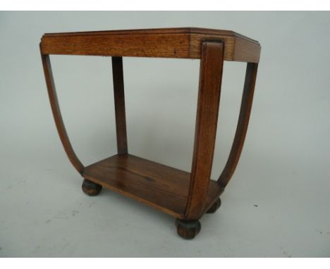 An Art deco style console table with curved legs and under shelf on bun feets 60x37x56cm 