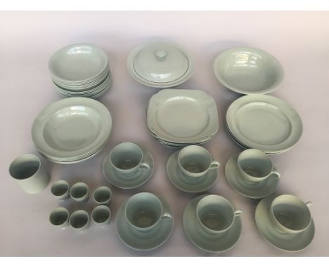 A Spode Flemish Green part dinner service including cups, platter, plates, bowls etc.