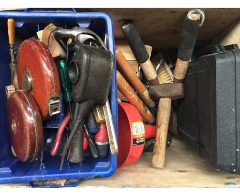 A large quantity of tools including hammer, pliers, large clippers, paint brushes, a vintage brass oil dispenser, two vintage