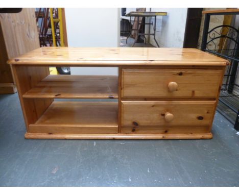 A pine side table comprising of two drawers and a shelf 110 x 45 x 45cm