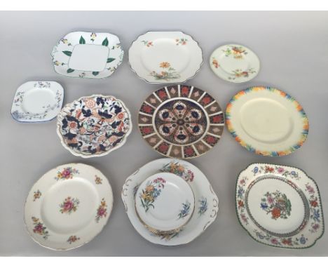 A small selection of retro plates from various makers such as Royal Crown Derby bone china plate, with Imari style painted an