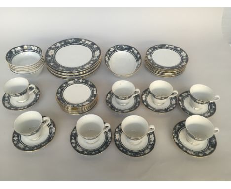 A Royal Doulton Vogue Collection Intrigue dinner service of 39 pieces including:  eight dinner plates, eight starter plates, 