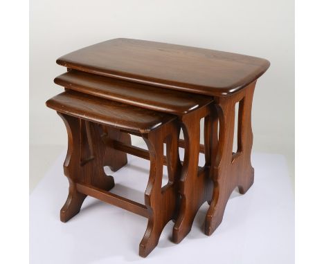 Ercol elm nest of tables, three graduating sizes, the largest 57cm wide