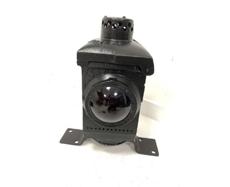 Railway crossing signal warning lamp having a black painted finish with original cast iron bracket moun, twin with red glass 