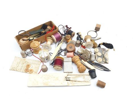 Box of vintage sewing items including three silver thimbles, mother of pearl thimble case, tape measures, reels etc - Conditi