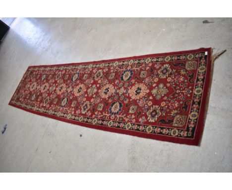 A traditional wool carpet runner, approx. 357 x 92cm