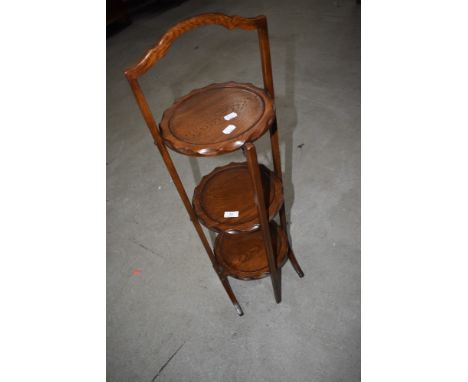 A vintage mahogany cake stand