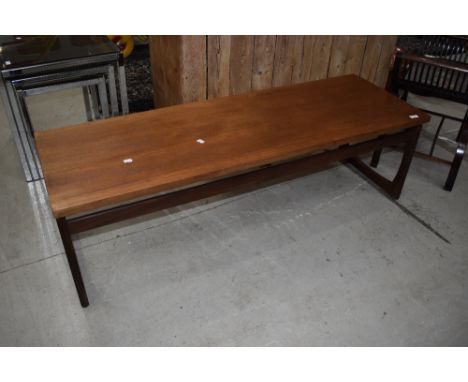 A vintage teak coffee table, stamped E Gomme (G Plan), approx. 137 x 46cm