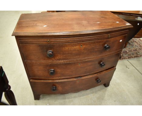 A 19th Century bow fronted chest of three drawers (plus brushing slide) on bracket feet, nice proportions, width approx. 103c