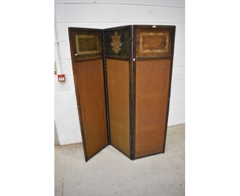 A traditional folding firescreen having linen panels