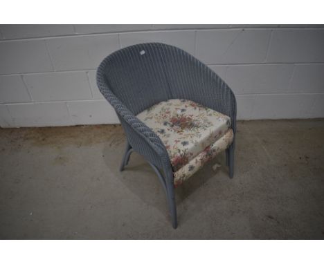 A vintage Lloyd loom tubchair finished in powder blue